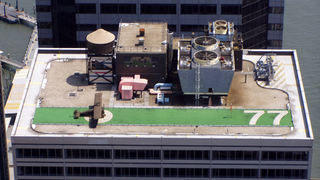 Illustration for article titled Manhattan's secret rooftop warplane